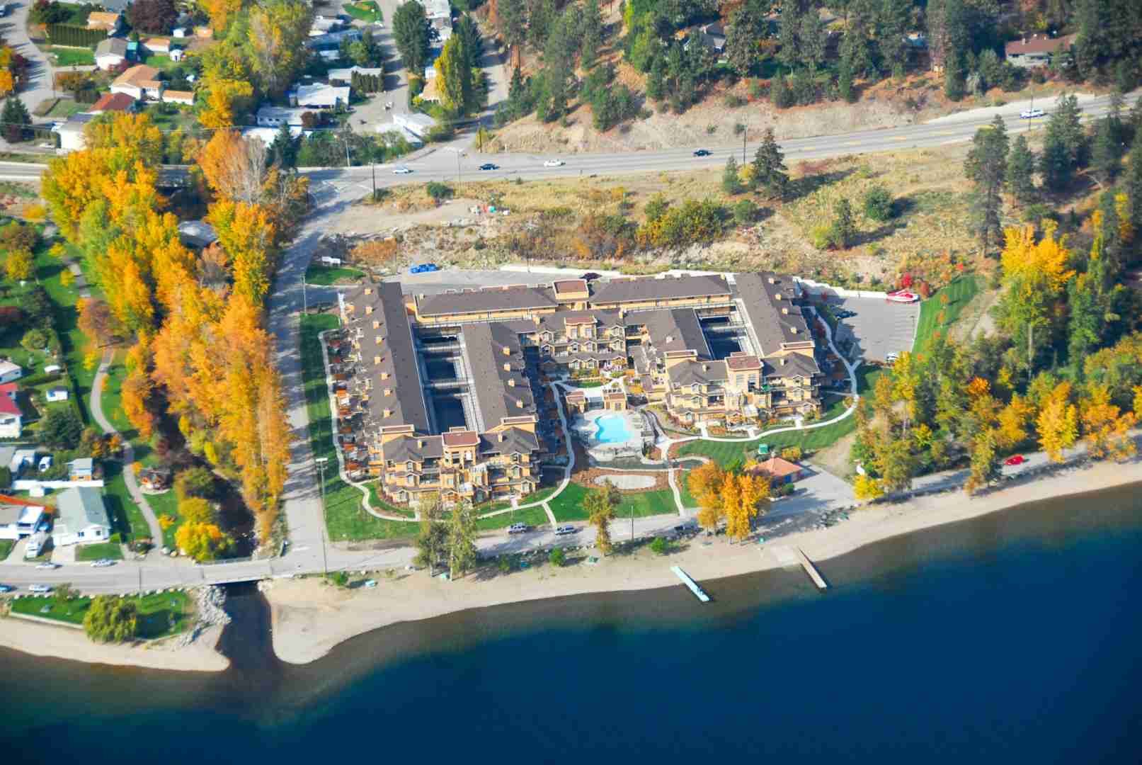 Aerial view of a lakeside residential complex in Peachland